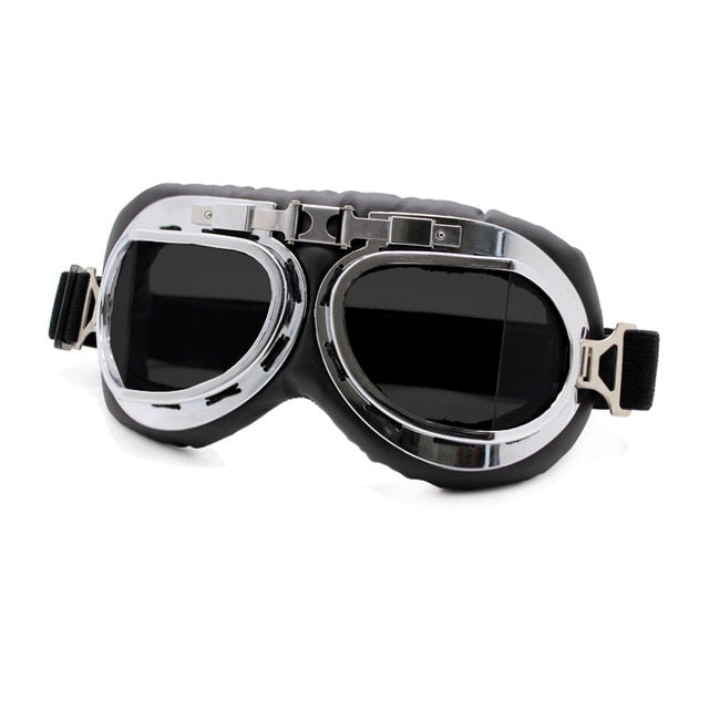 antique motorcycle goggles dark tint lense metallic frame over black leather