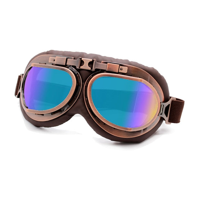 motorcycling goggles mirrored lense on copper frame over tobacco colored leather
